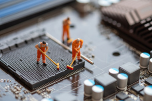 Small people cleaning a processor